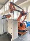 使用済み KUKA KR240 PLCコアコンポーネントとDeviceNet通信プロトコルの工業用カスタマイズされたパレットロボット